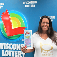 ONE GRAND IN HAND Winner - SARAH H