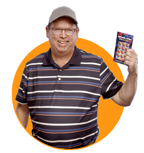 smiling wisconsin lottery winner in golf shirt with blue, white and orange stripes with glasses and tan baseball hat holding up winning ticket on orange circle background