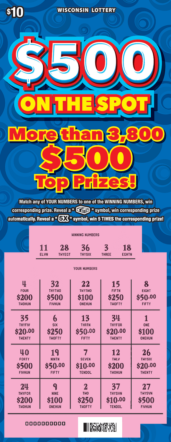 $500 on the Spot Scratch Game image of scratch ticket with a blue background and dark patterned circles. Play area contains a five by four chart that is scratched off revealing pink play area on scratch ticket from wisconsin lottery